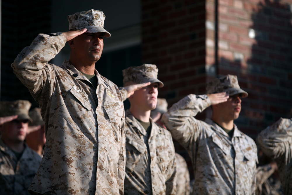 Marines salute at morning colors