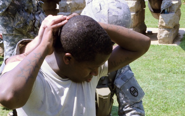 Keeping the peace: Soldiers prepare to help quell violent crowds