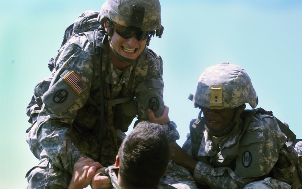 Keeping the peace: Soldiers prepare to help quell violent crowds
