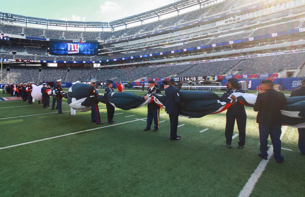 Marines unfurl flag at New York Giants opening game