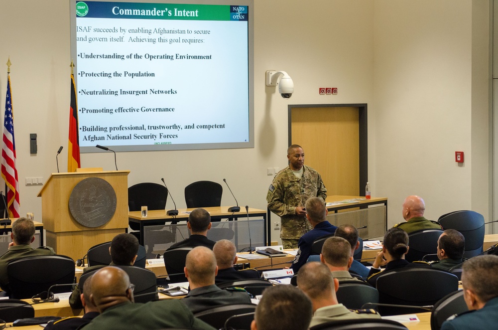 ISAF Command Sgt. Maj. Capel briefs at the ISES