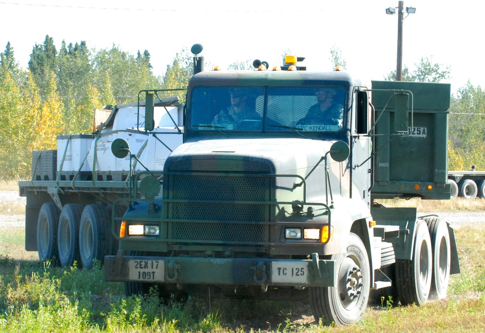 M915 and M872 negotiate 539th Transportation Company's Truck Rodeo