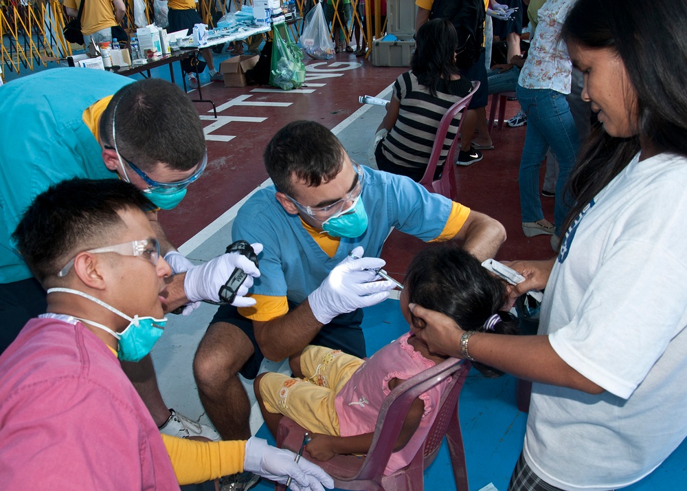 Extracting a patient's tooth