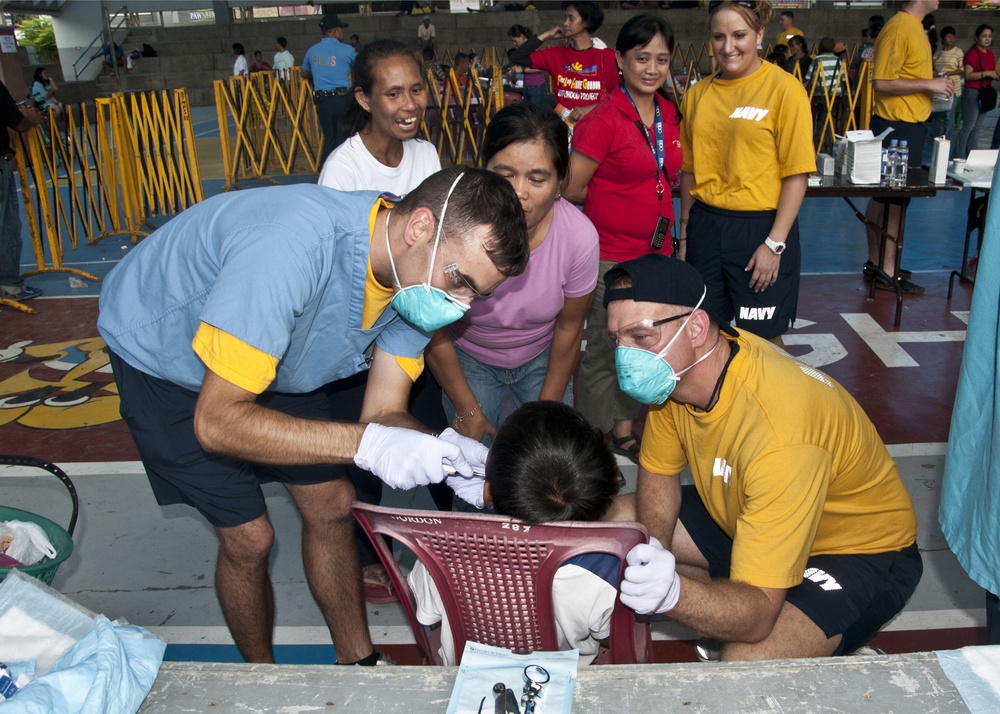 Extracting a patient's tooth