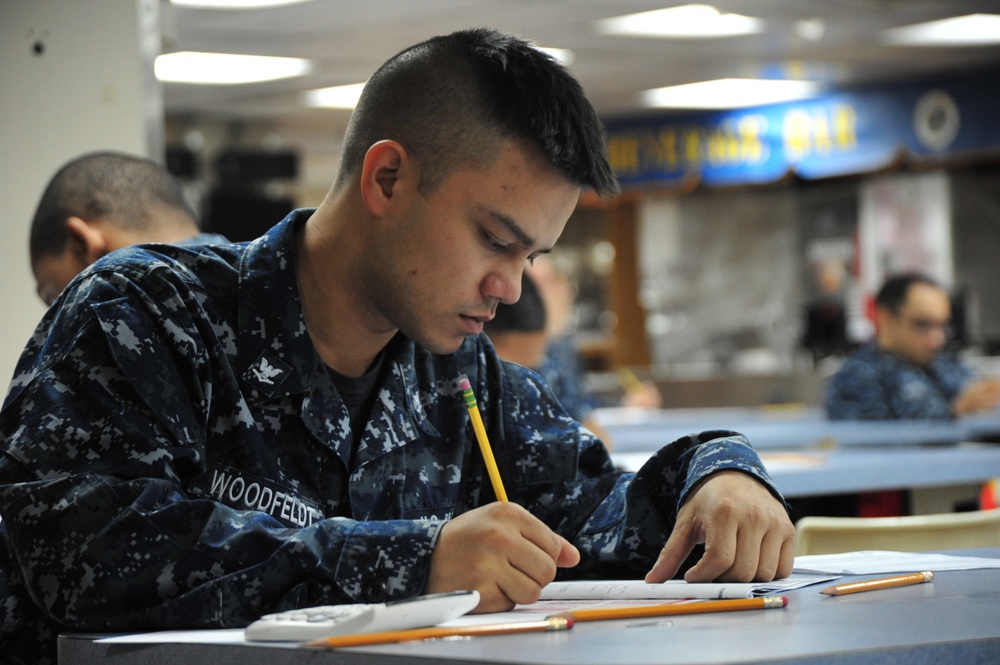 USS Blue Ridge sailors take the E-5 exam