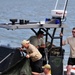 Texas guardsman and other local authorities participate in water jump