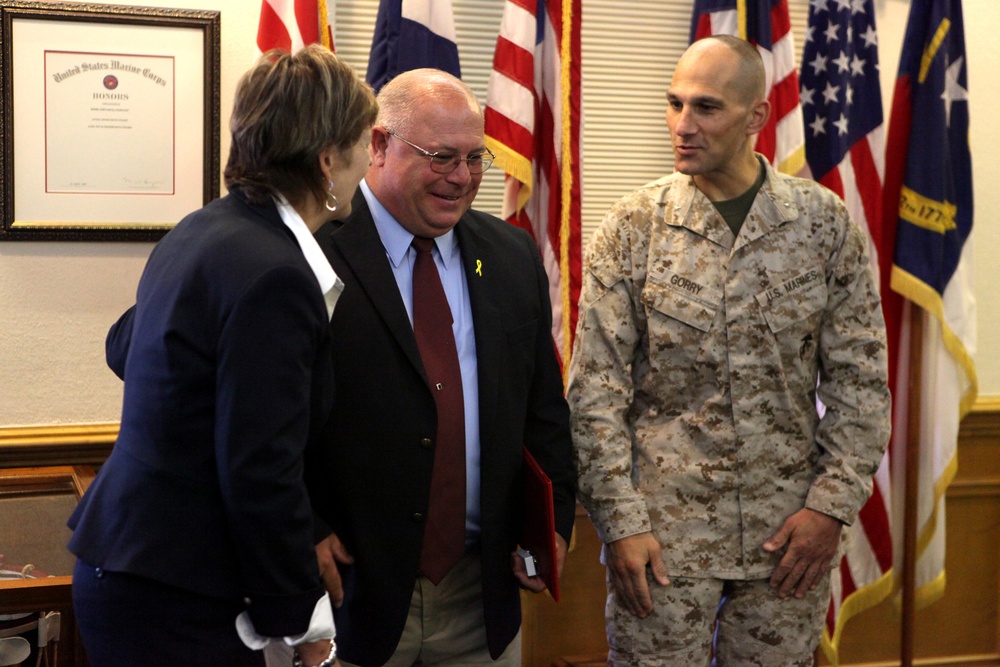 Jesse L. Turner is congratulated for his award
