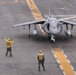 Sailors direct an AV-8B Harrier