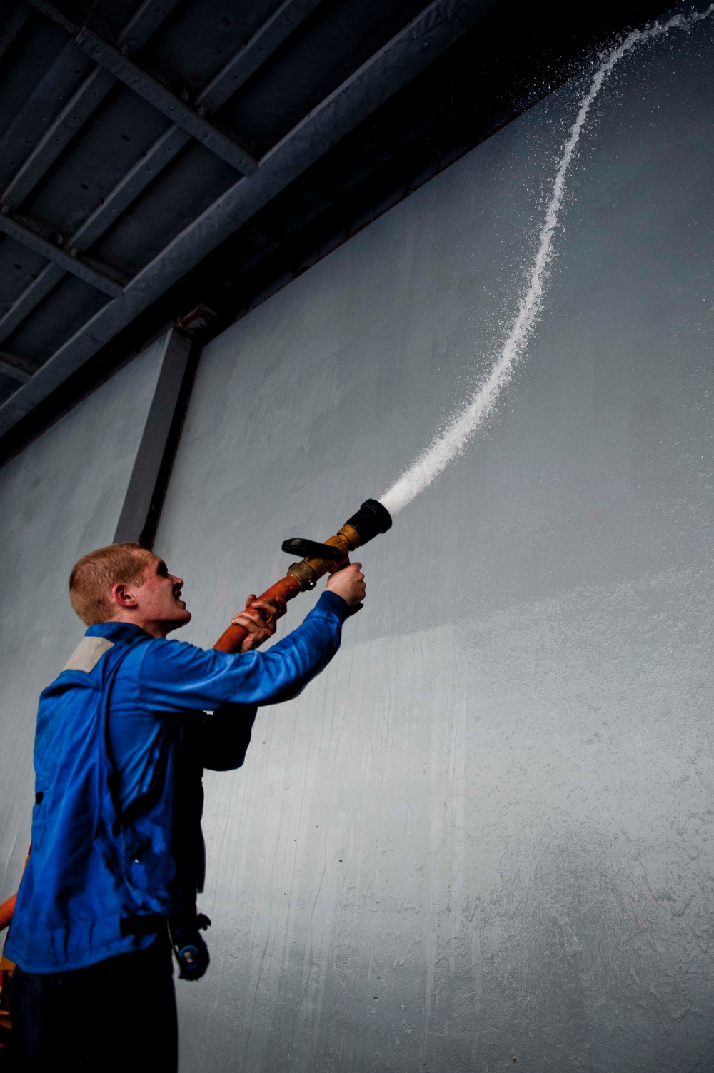 USS Iwo Jima sailor at work