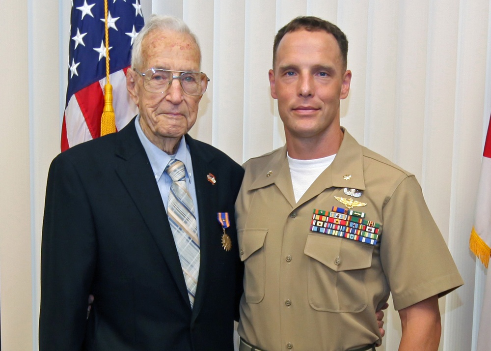 Marine Pilot Presents Award to WWII Veteran after 68 Years