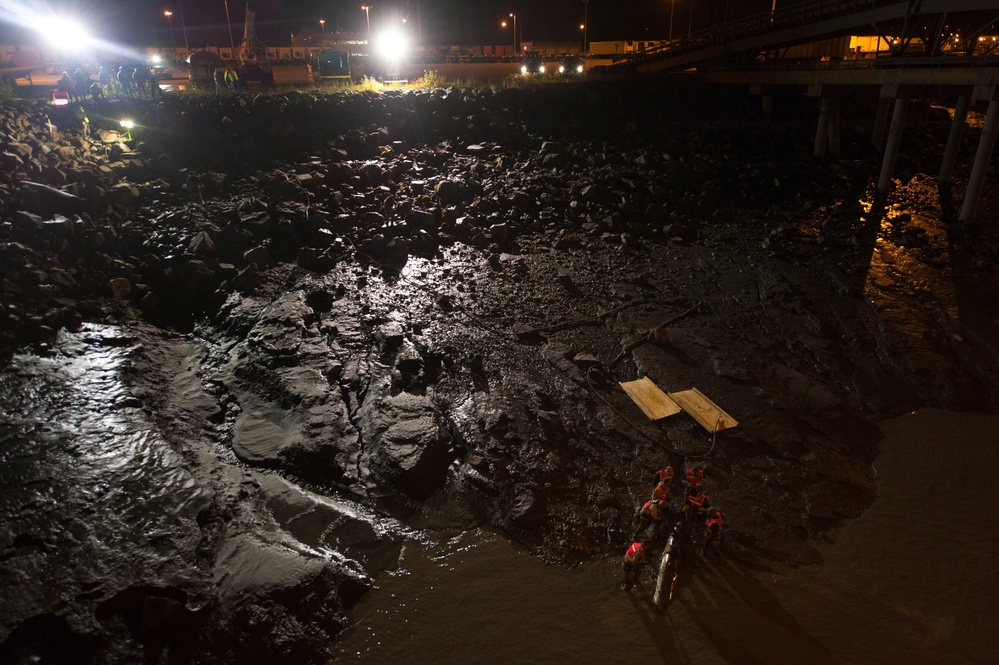 JBER airmen recover F-4 Fuel Tank from Port of Anchorage