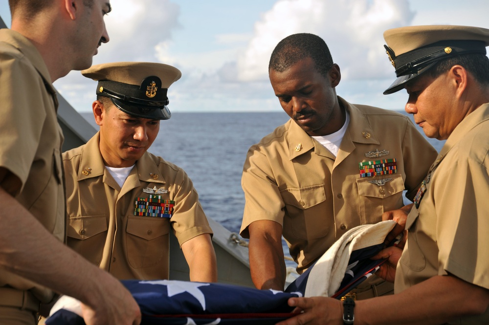 Chief petty officers fold flag