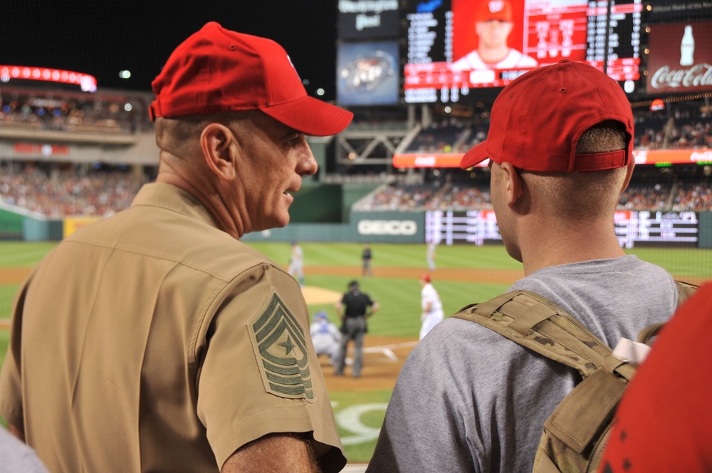SEAC, Mrs. Battaglia spend a night at the ballpark with 14 wounded warriors
