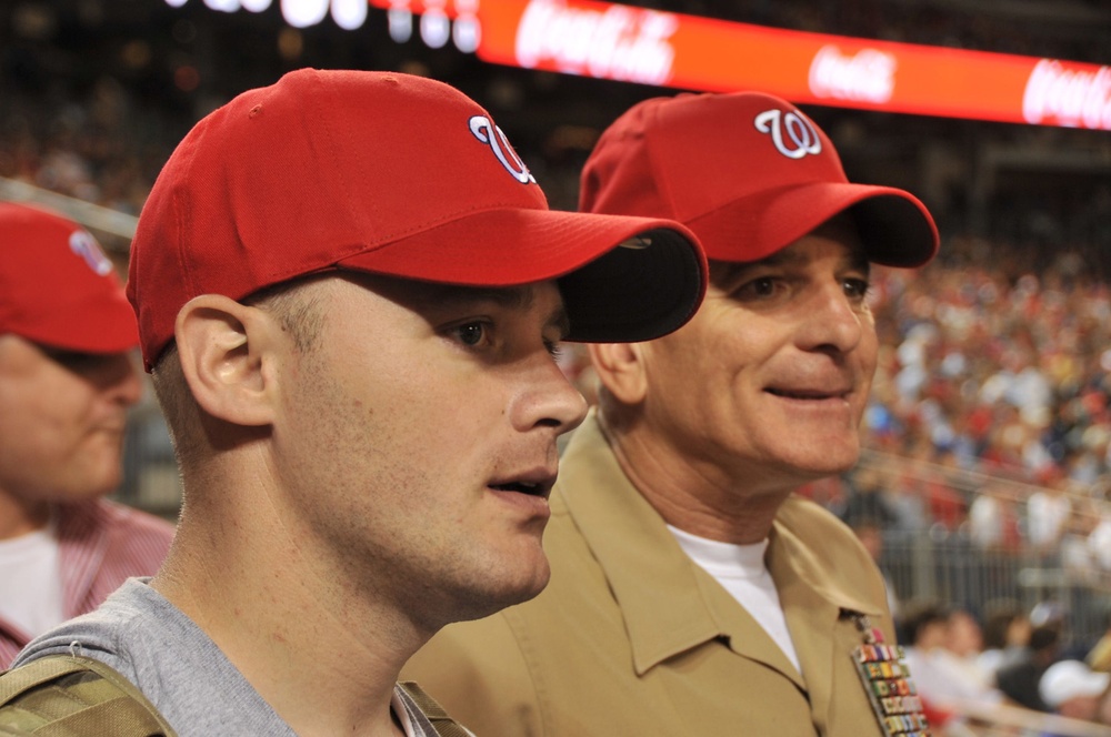 SEAC, Mrs. Battaglia spend a night at the ballpark with 14 wounded warriors