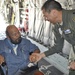 Lt. Col. Caesar Garduno presents MOH Recipient Hernandez with a unit coin