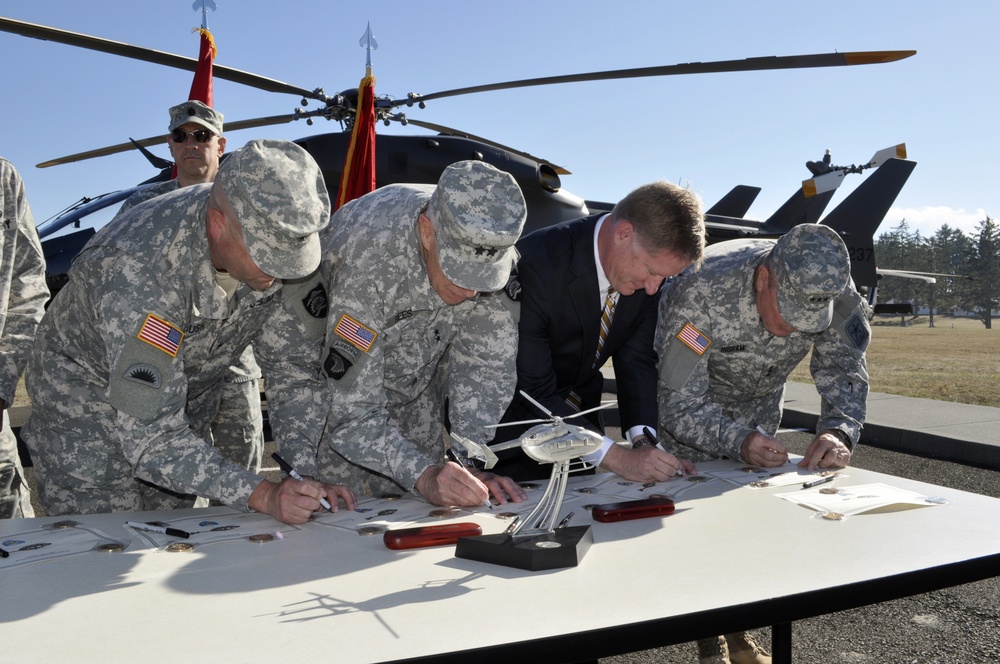 Oregon Army National Guard commanders sign for new UH-72A Lakota helicopter