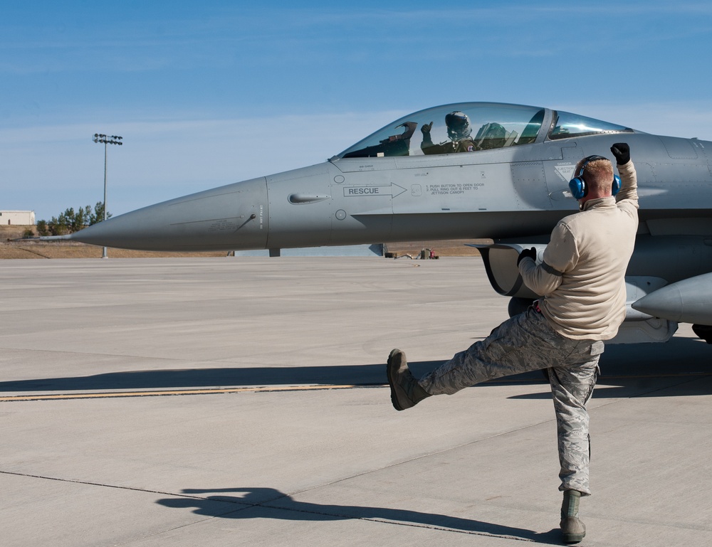Bones share the air with Lobos during exercise