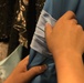 Gown Giveaway Draws Military Masses
