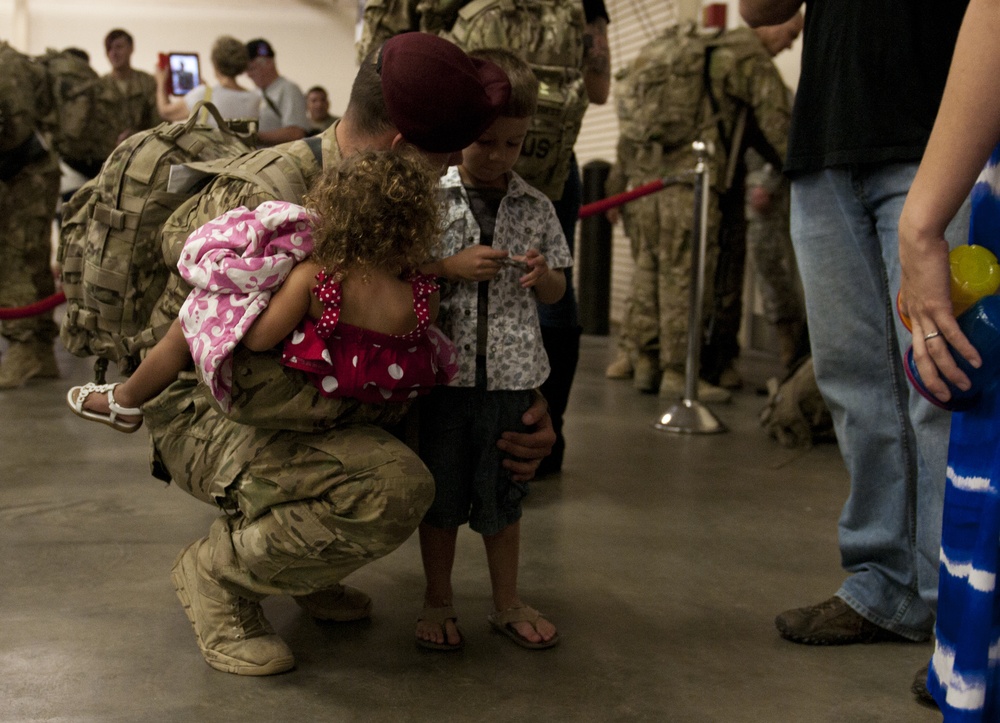 A paratrooper with 2nd Battalion, 505th Parachute Infantry Regiment, 3rd Brigade Combat Team, 82nd Airborne Division reunites