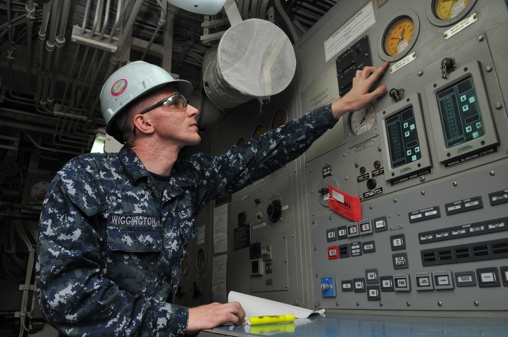 USS Ronald Reagan sailor at work