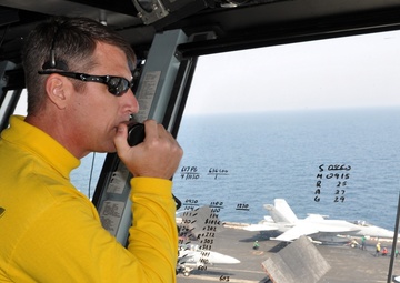 Sailors at work aboard USS Dwight D. Eisenhower