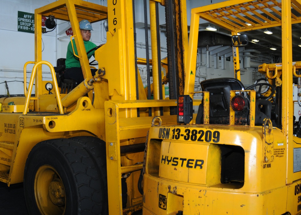 USS George H.W. Bush sailors at work