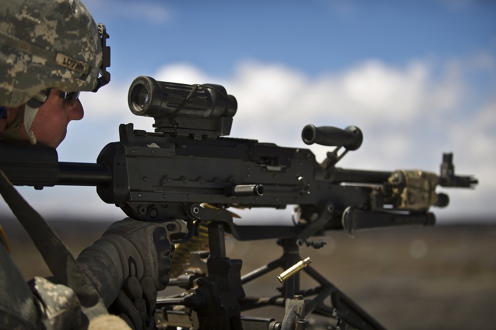 US Army machine gun crews from Alpha Company site their weapon at the firing range