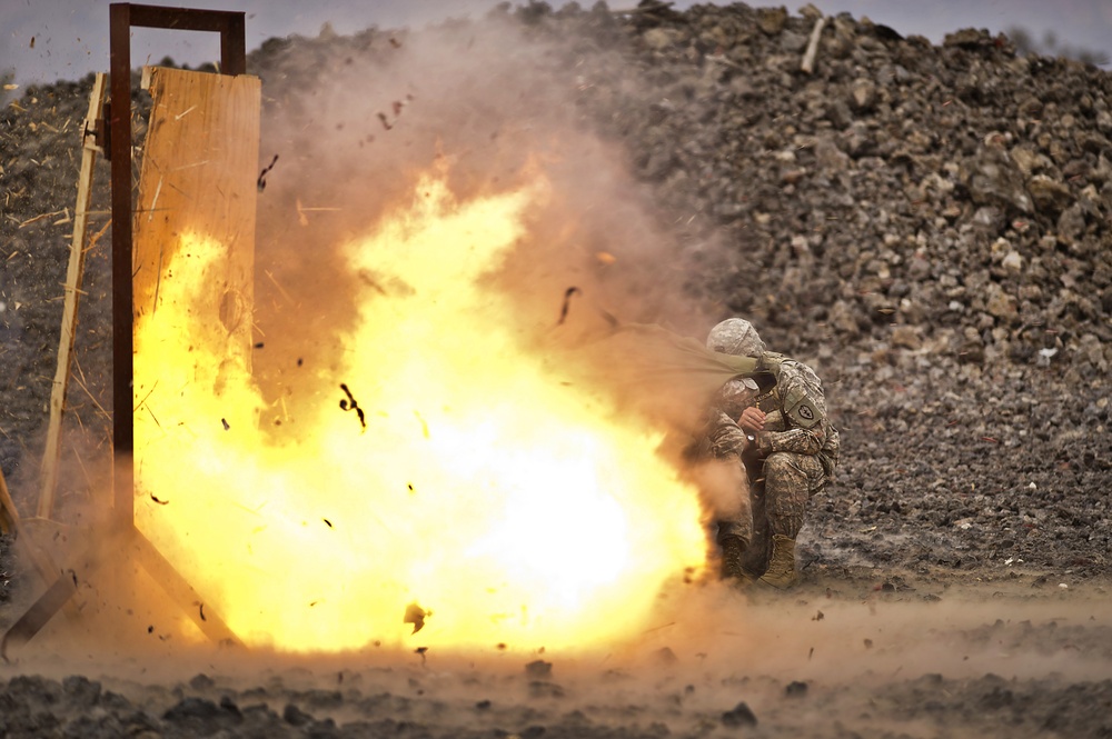 1-21 soldiers practice door breaching techniques with 66th Engineer Co.