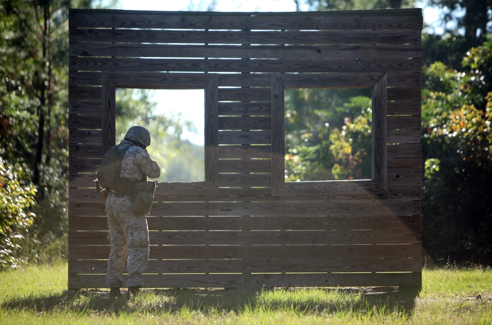 Marines work together to navigate movement-to-contact course