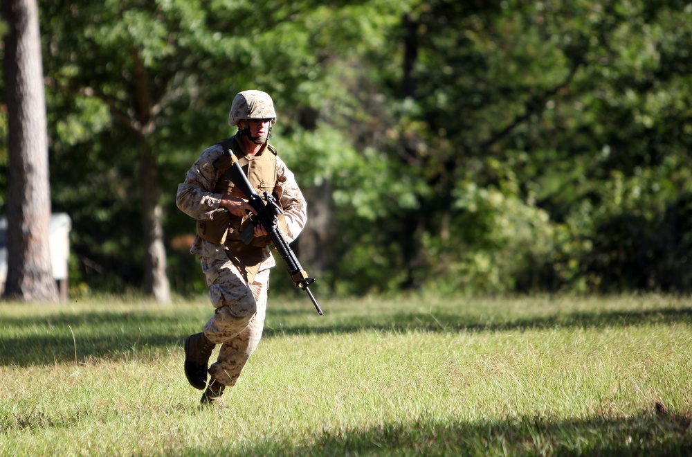 Marines work together to navigate movement-to-contact course