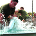 Yuma ARFF Marines cool off during fireman competition