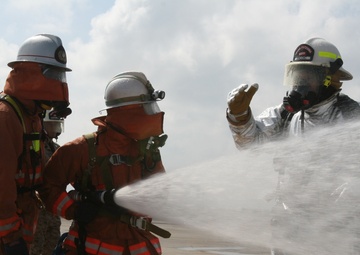 Okinawans, Marines sharpen aircraft fire, rescue procedures