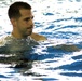 Staff Sgt.  Roman Barabash, Marine Aviation Logistics Squadron 12 ground support equipment mechanic, runs through the water during the Marine Corps Aquatics Cadence and Reconditioning Program Training at the IronWorks pool here Sept. 6, 2012