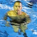 Sgt. Christopher Flores, Marine Wing Support Squadron 171 engineers platoon sergeant, runs through the water during the Marine Corps Aquatics Cadence and Reconditioning Program Training at the IronWorks pool here Sept. 6, 2012