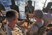 Marines sight in onboard USS Rushmore