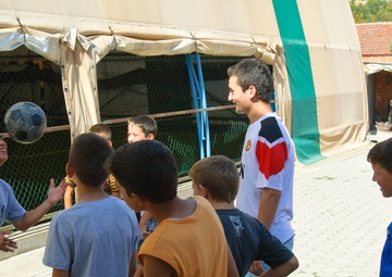 Soldiers build relationships by hard work and fun