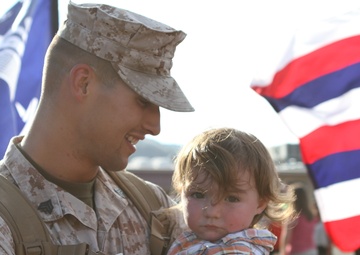 Friends and families gather to welcome Marines of 1/1 home