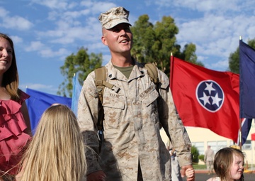 Friends and families gather to welcome Marines of 1/1 home