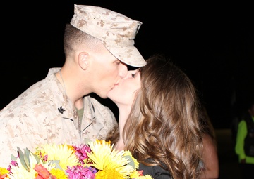 Friends and families gather to welcome Marines of 1/1 home