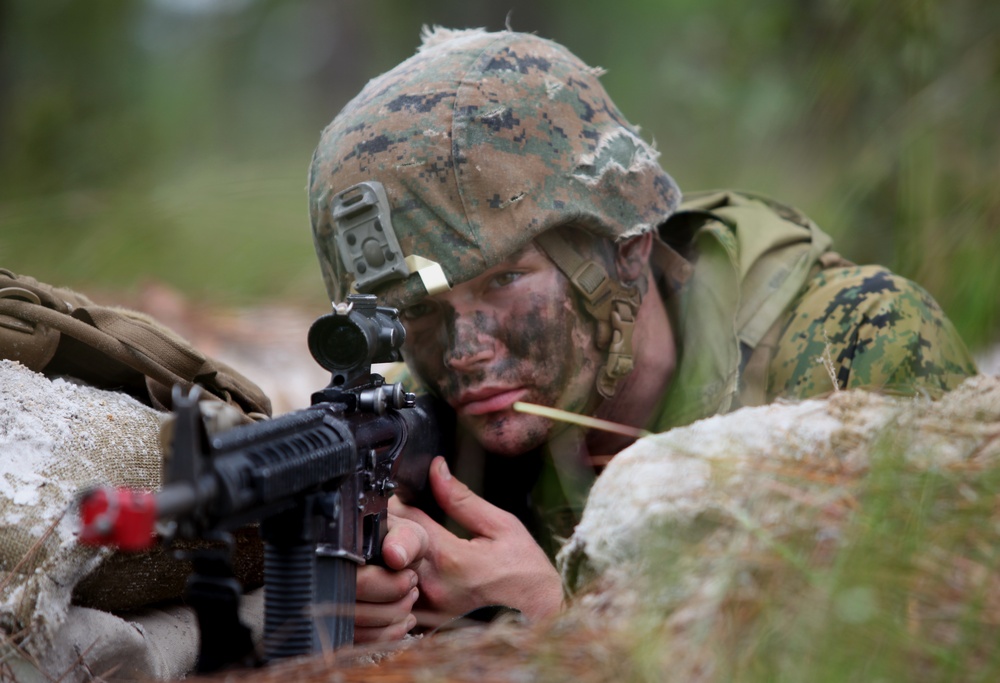Marines practice blocking techniques to cordon enemy