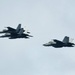 F/A-18E Super Hornet aircraft perform a flyby