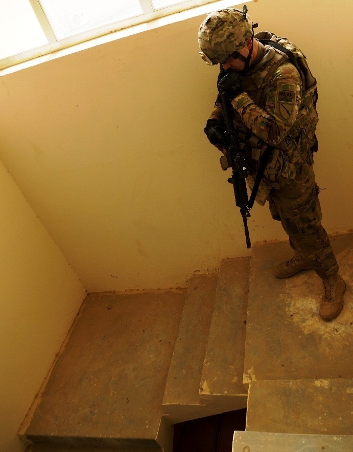 A Kentucky National Guard soldier checks the stairs in southern Afghanistan