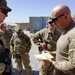 Soldiers discuss security strategy during a mission in southern Afghanistan