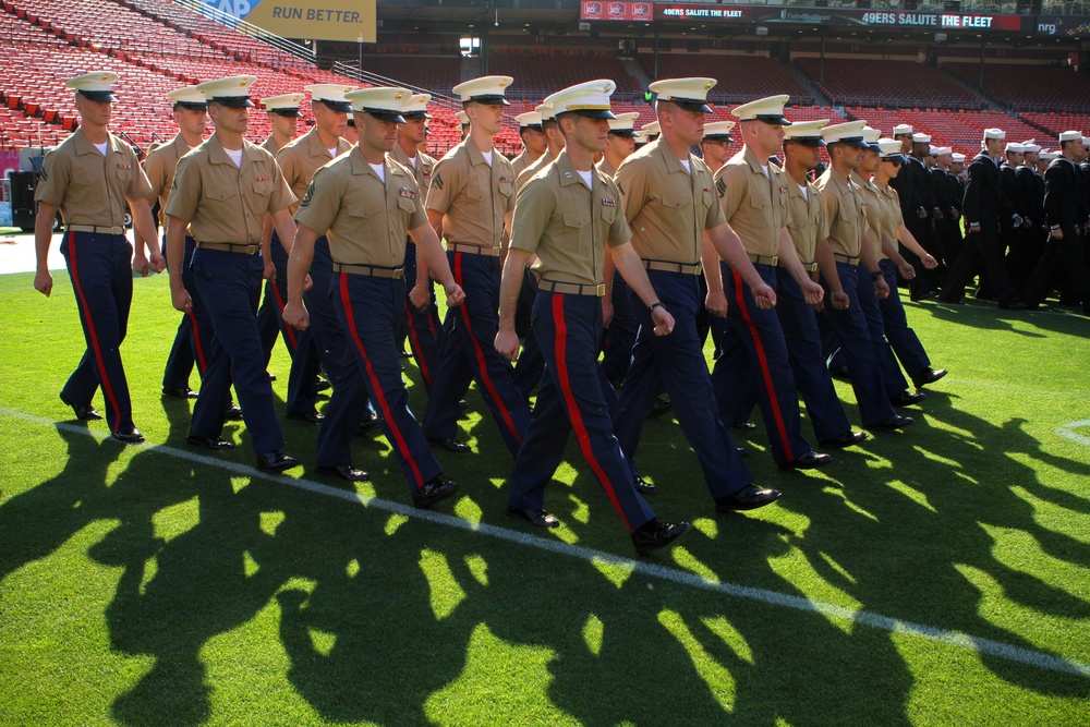 San Francisco Fleet Week military members salute at 49ers game