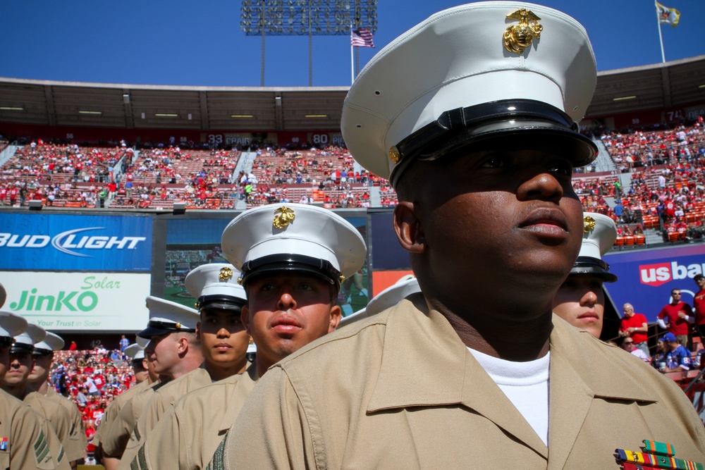 San Francisco Fleet Week military members salute at 49ers game