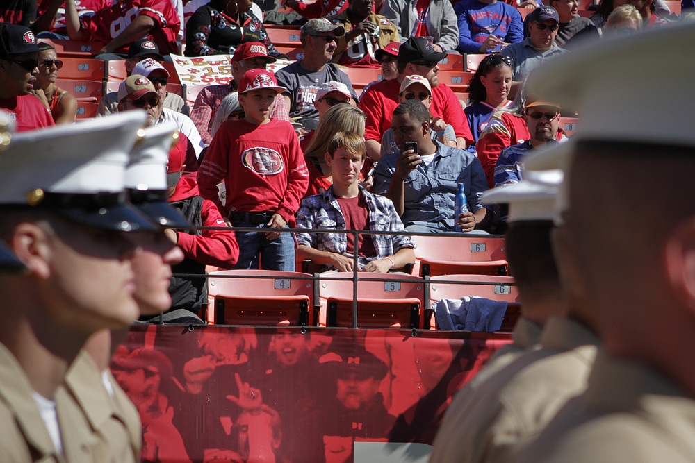 San Francisco Fleet Week military members salute at 49ers game