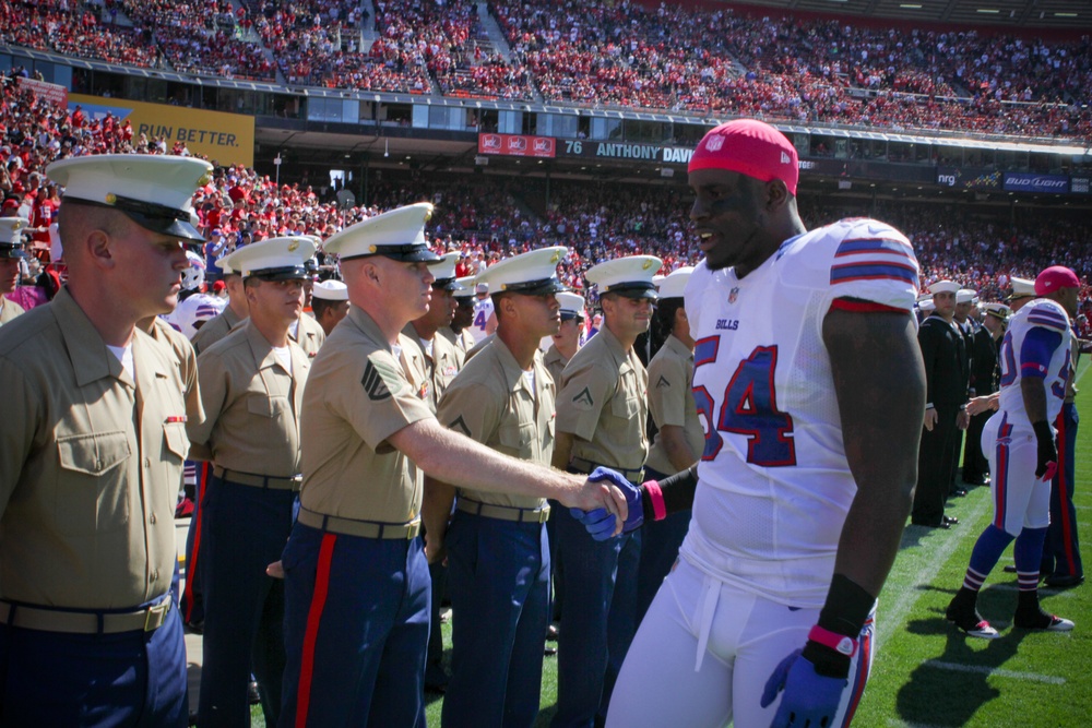 San Francisco Fleet Week military members salute at 49ers game