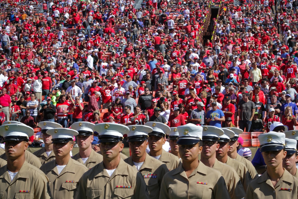 San Francisco Fleet Week military members salute at 49ers game