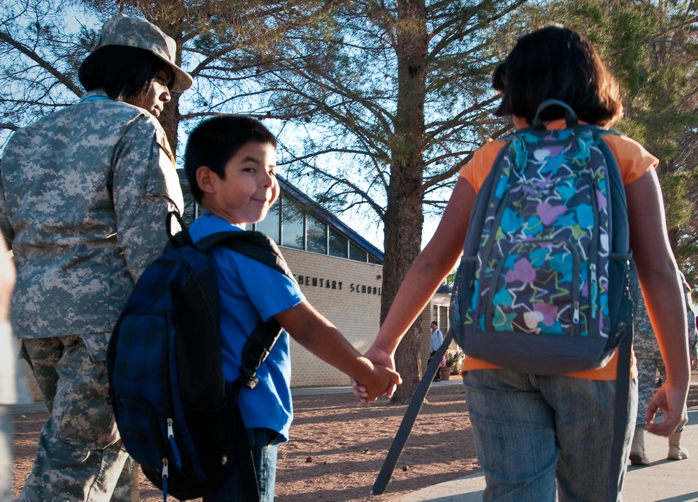 SAMC soldiers walk children to school, promote safety