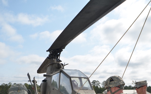 Technical inspectors assess downed equipment to keep mission going